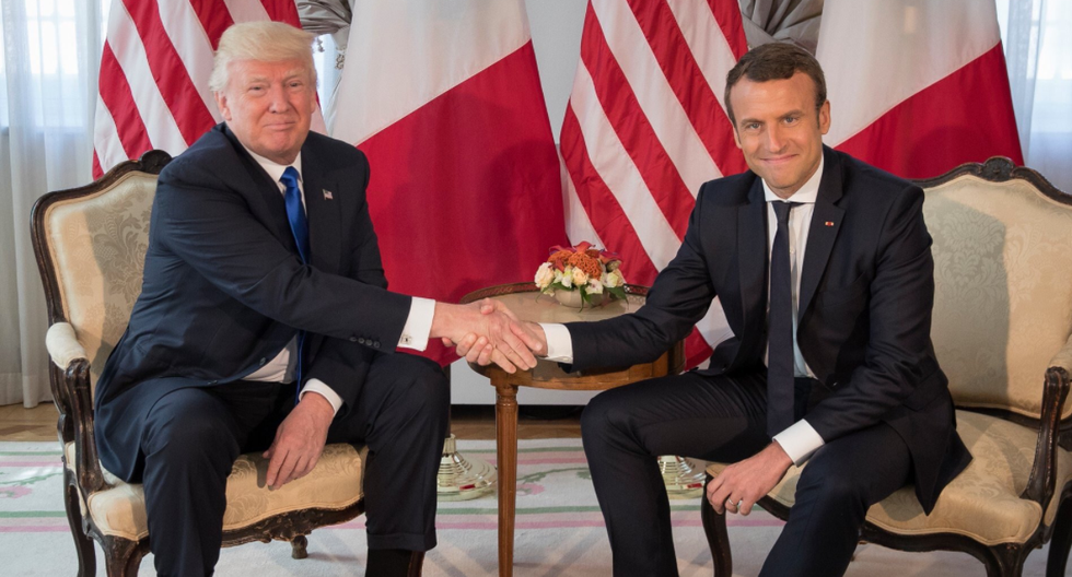 Internet cheers as French president beats Trump at his own 'bullsh*t macho handshake game'