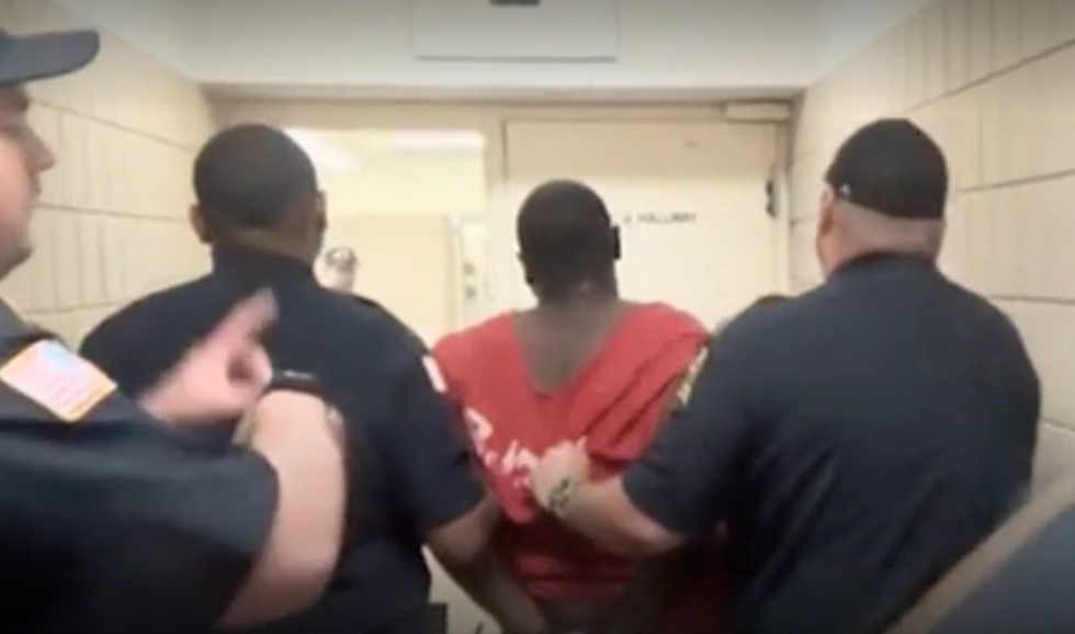 Shocking video shows how guards at for-profit prison left sick prisoner to die despite pleas for help