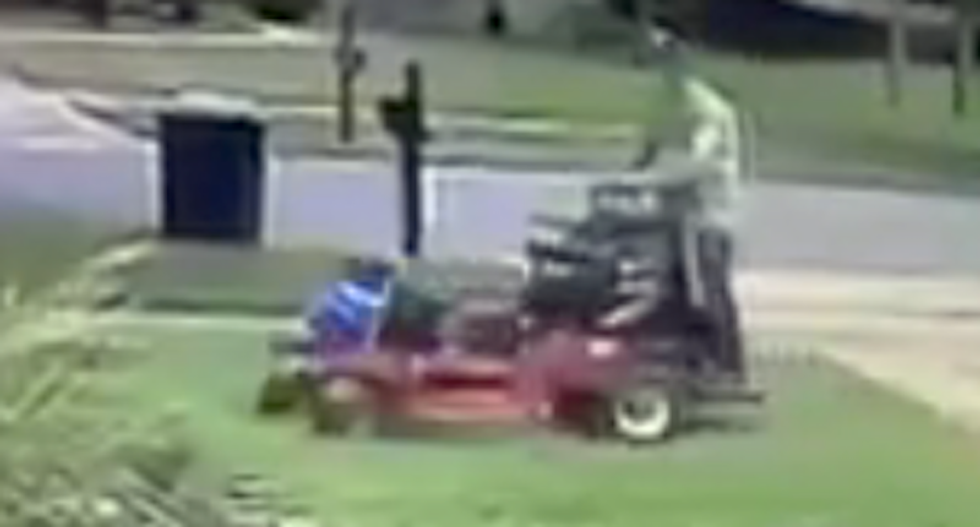 WATCH: Landscaper infuriates Florida man by running over his Trump sign with lawnmower -- repeatedly