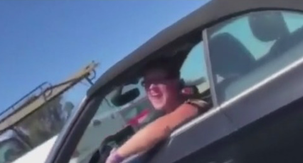 WATCH: Road-raging white woman almost crashed before calling victims N-word -- and then she got sacked