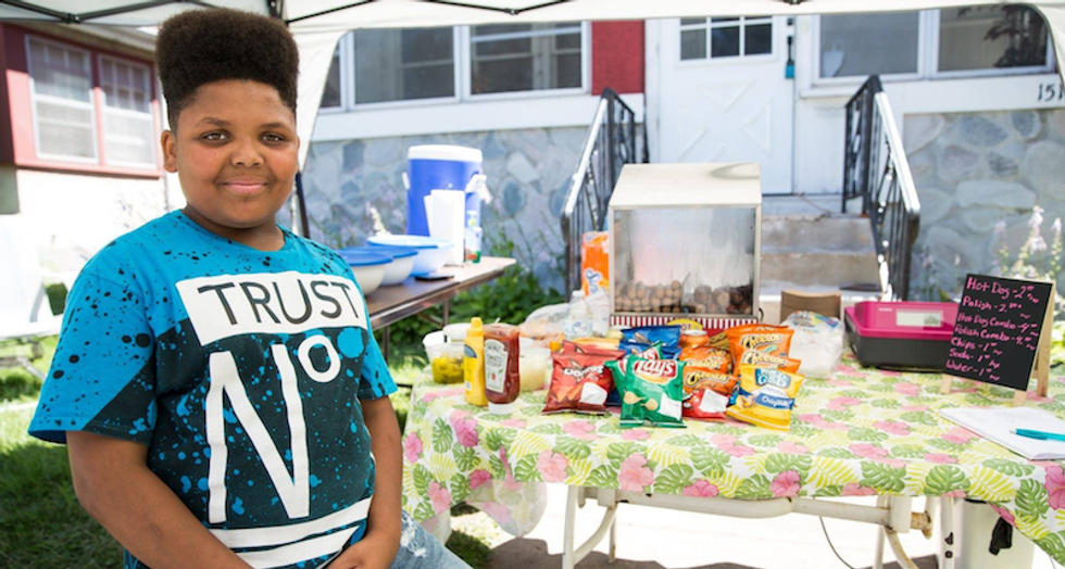 WATCH: Neighbor reports black Minnesota boy's hot dog stand -- and the cops took the kid's side
