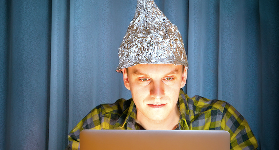 Why people believe in conspiracy theories – and how to change their minds