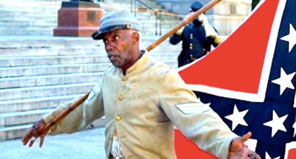 Bystanders break up bizarre scuffle between angry KKK members and black pro-Confederate activist