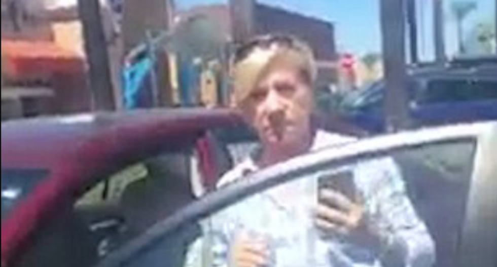 WATCH: White shopper calls police on black woman for taking parking spot she assumed was hers