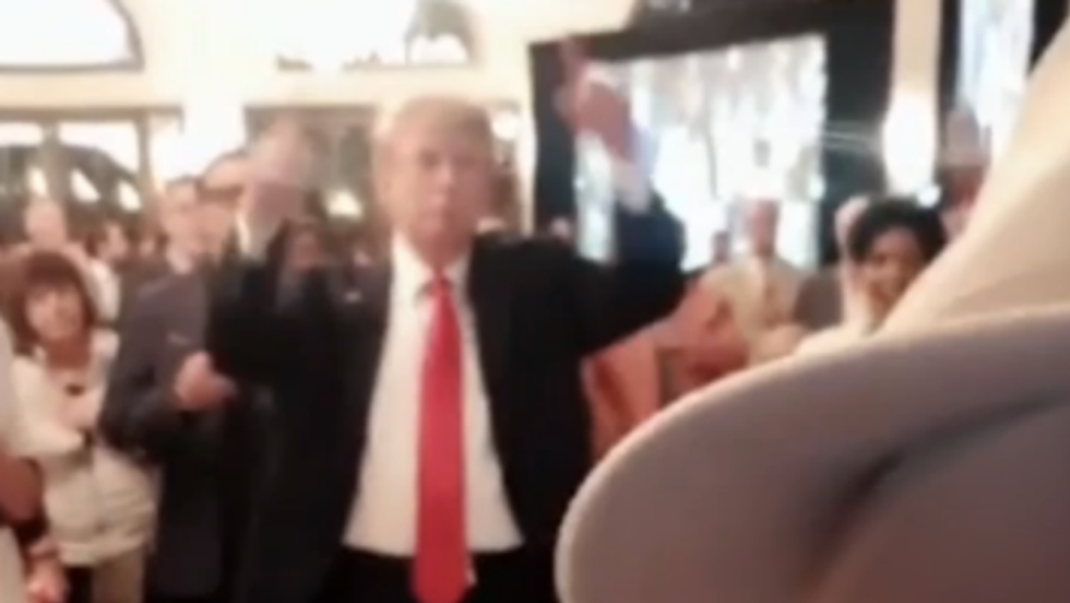 'He's hitting the Adderall again': Trump caught on video waving hands and fidgeting during National Anthem