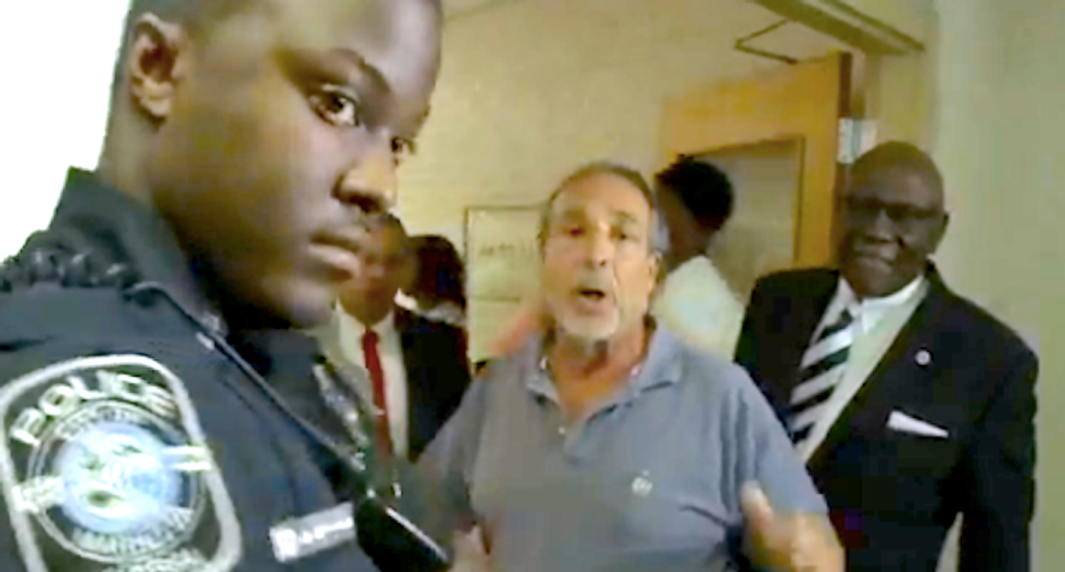 'It's a police state': School board meeting goes off the rails after first black principal reassigned