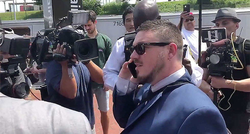 WATCH: Unite the Right rally organizer Jason Kessler whines when cops say he can't bring flagpole