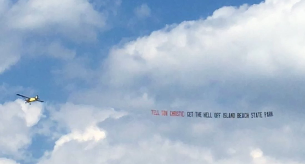 WATCH: Christie trolled by plane banner demanding he 'get the hell off the beach' -- and beachgoers cheer