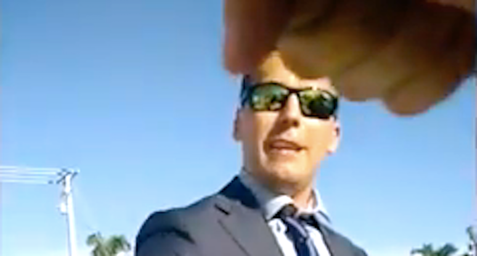 Florida cops defend officer who gave fist bump to white supremacist holding anti-Semitic sign