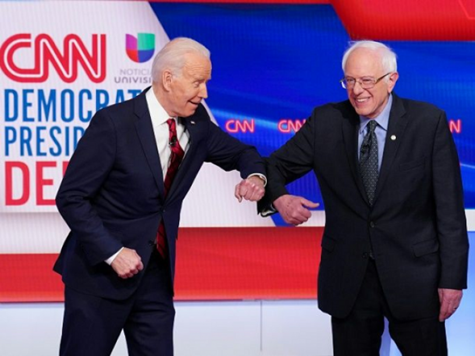 Biden says 'hard to envision' Democratic convention taking place in July as Sanders vows to stay in race