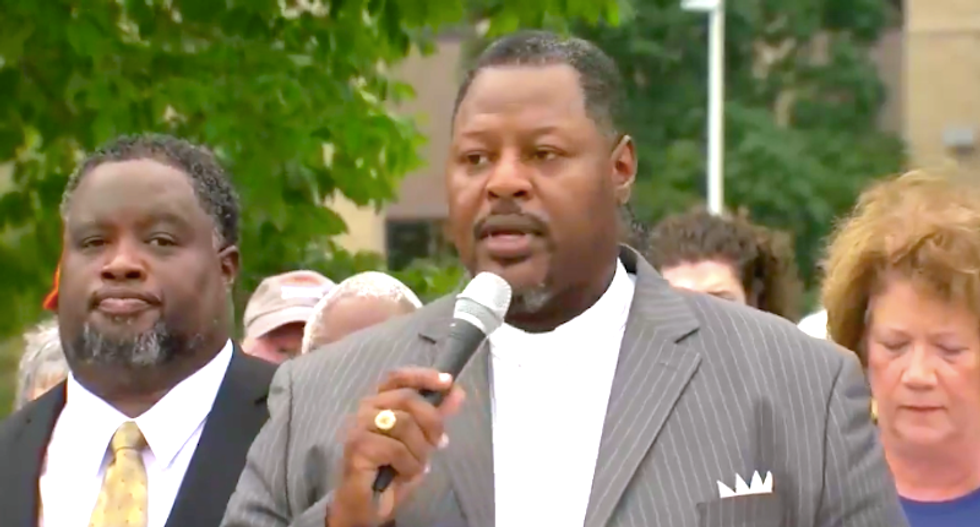 Black pastors left stranded by flat tire were grilled by cop about guns and drugs instead of getting help