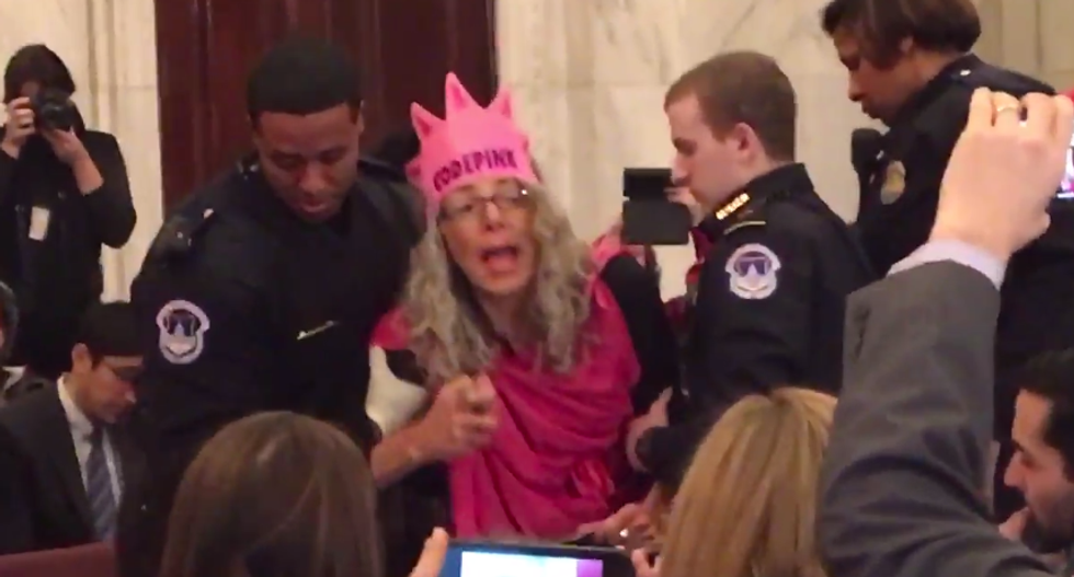 Justice Department pushes judge to give jail time to woman convicted of laughing at AG Sessions