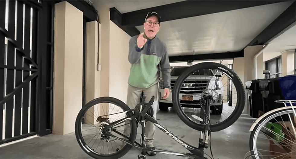 Stephen Colbert shows people how to change a bike tire -- but it doesn't go exactly as planned