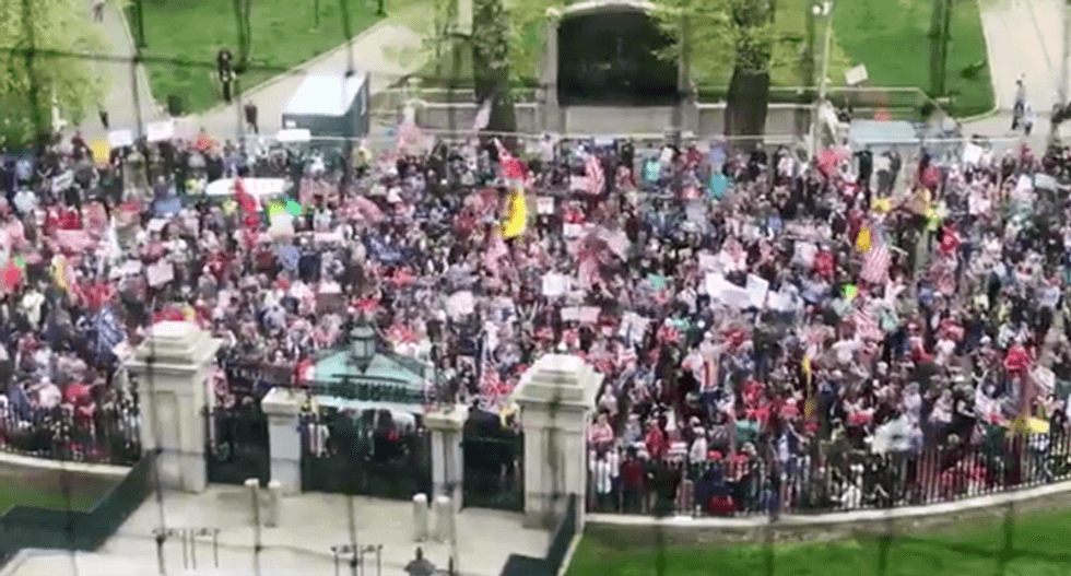 ‘It’s not a pandemic’: Boston protesters chant ‘it’s a hoax’ and ‘Make America Great Again’