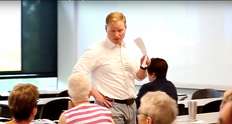 Kansas voters laugh out loud when Republican tries to shut down town hall after tough questions on guns