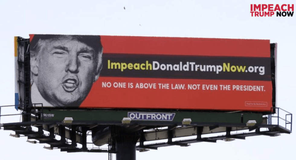 Activists plant 'IMPEACH' billboard directly in Trump's path to Mar-a-Lago