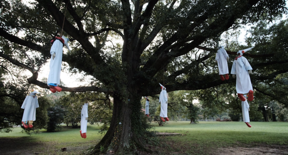 Activist group hangs effigies of clowns dressed in KKK robes from Virginia tree