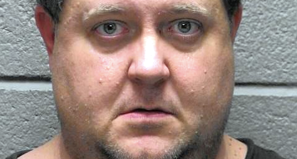 Indiana man claims he fired gun at fleeing black man to keep him from being hit by car