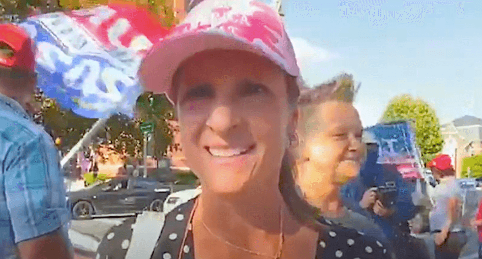 WATCH: Violence flares at Trump rally as woman rants about the N-word