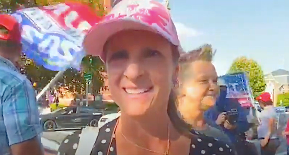 WATCH: Violence flares at Trump rally as woman rants about the N-word
