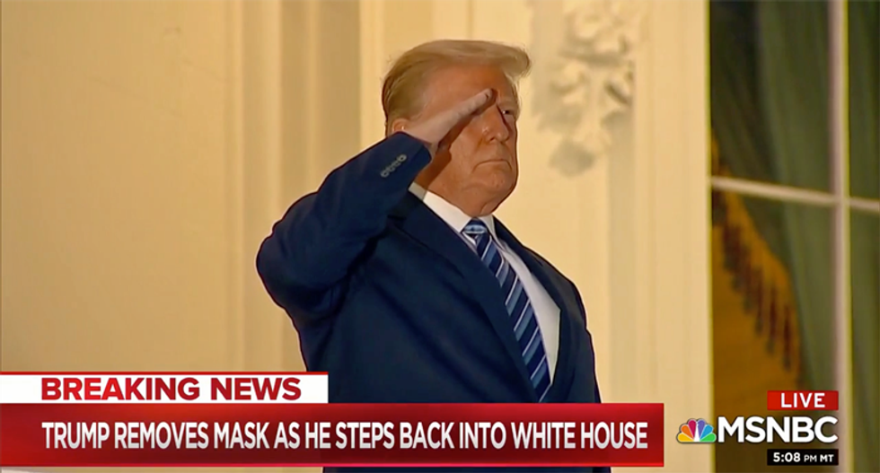 WATCH: Trump takes off COVID mask before entering the White House with the virus