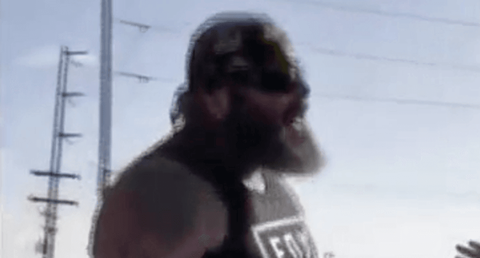WATCH: Trump supporter on the loose after punching progressive activists selling merch