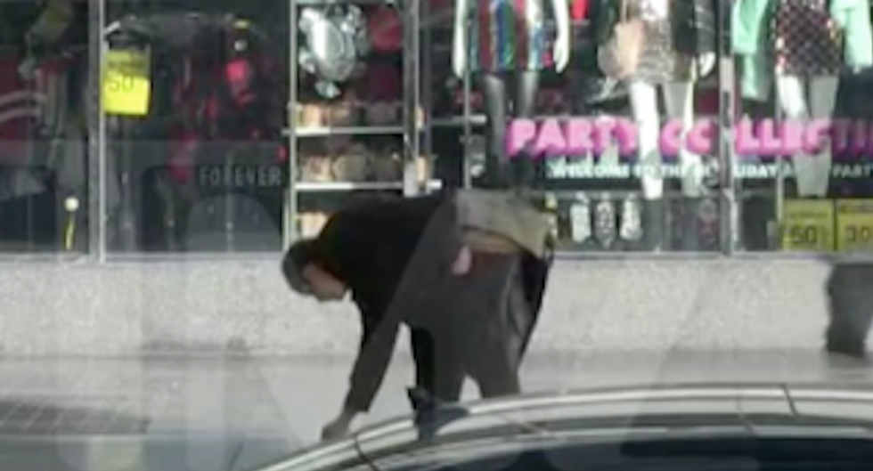 Watch: Vandal sprays Donald Trump's walk of fame star with swastika in broad daylight