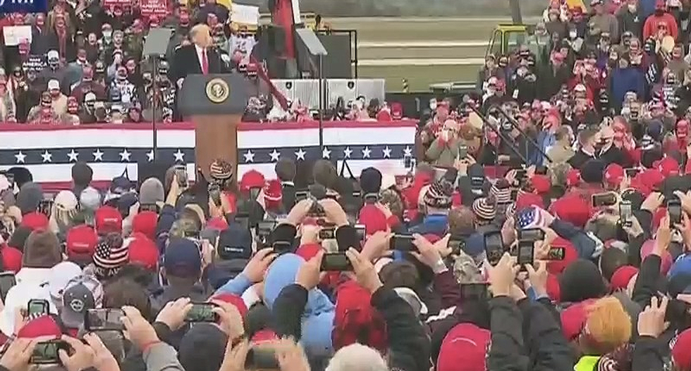 Trump laughs as Michigan rally chants 'lock her up' to governor the right-wing tried to kidnap and kill