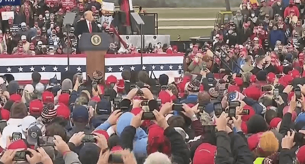 Trump laughs as Michigan rally chants 'lock her up' to governor the right-wing tried to kidnap and kill