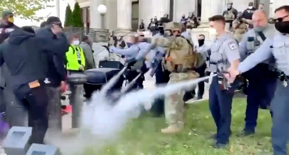 WATCH: Cops pepper-spray voters marching to the polls in North Carolina — including a 5-year-old girl