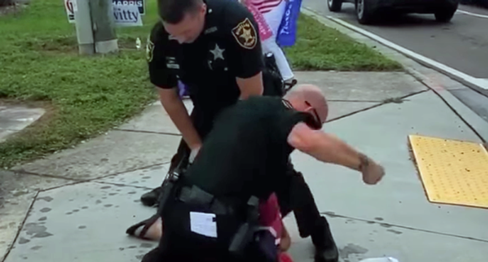 WATCH: Florida deputies caught on tape beating Biden supporter at political rally