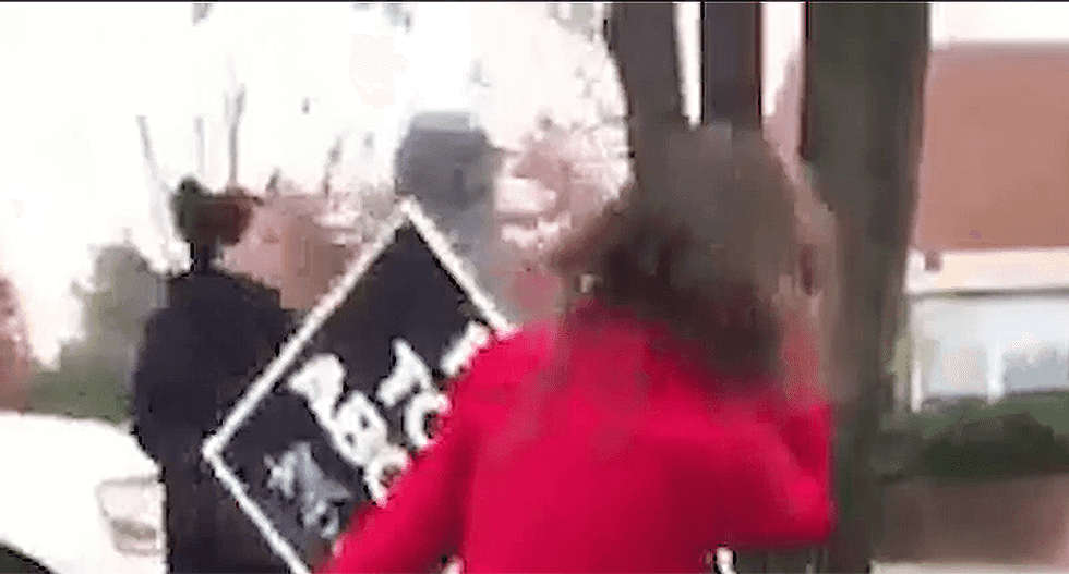 WATCH: Anti-choice Planned Parenthood protester gets slapped outside Virginia clinic