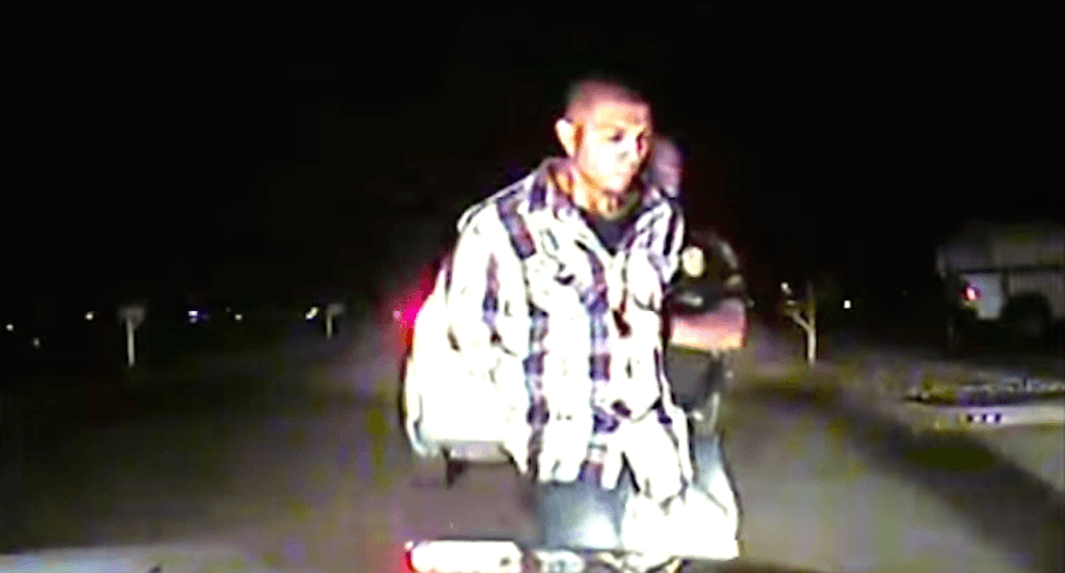 WATCH: Frustrated New Mexico cop slams handcuffed driver face-first onto road