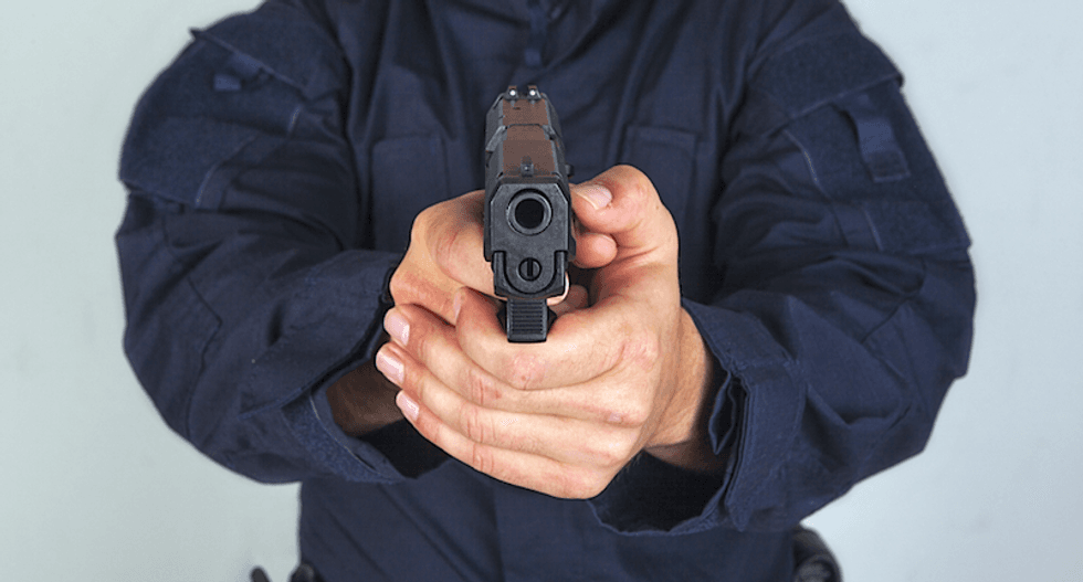Father of 21-year-old man killed by police says son surrendered before being shot to death