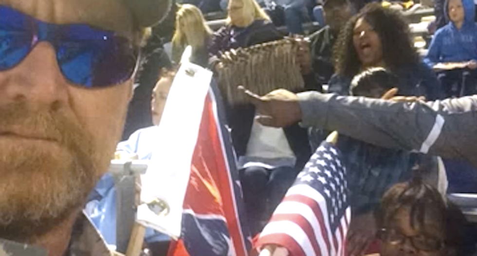 Accused cop killer waved Confederate flag at football game to protest 'cop haters' sitting out anthem