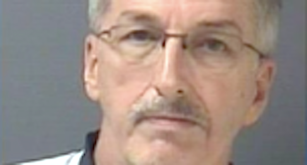 Michigan man grills kids at gunpoint over damaged Trump sign — until cops show up and arrest him