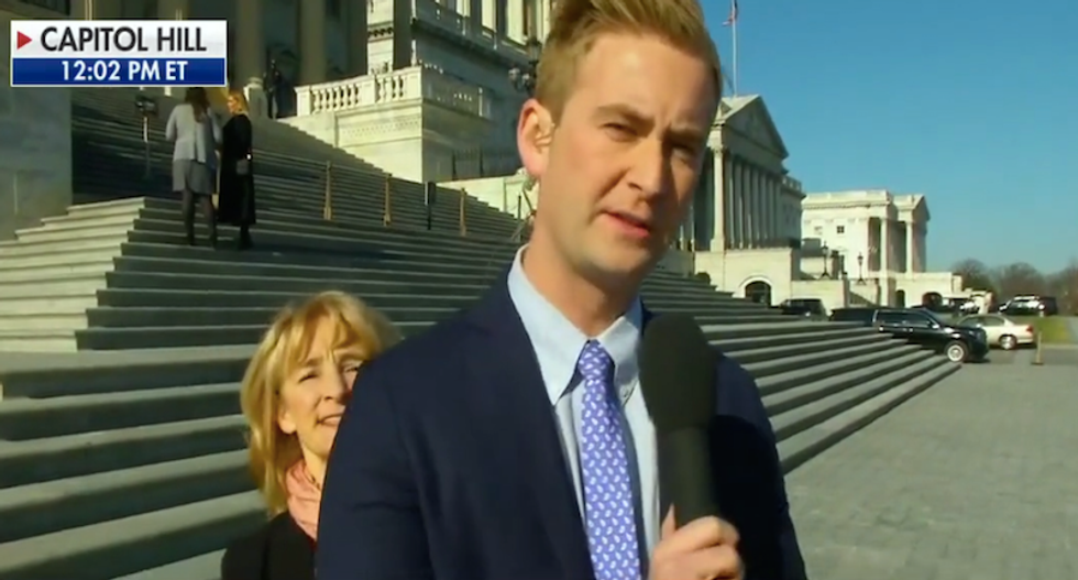 'The tax bill is a scam': Protester interrupts Fox News reporter gloating about GOP vote