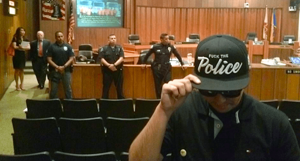 Mayor calls off California City Council meeting over CopWatch activist's 'F*ck the Police' hat