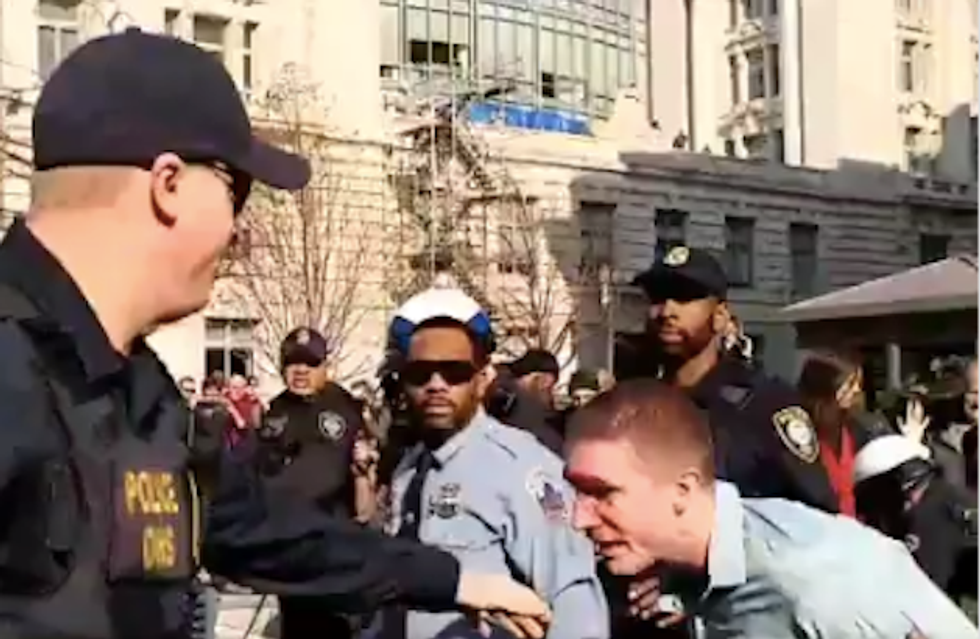 WATCH: Neo-Nazi attacks protesters in bloody melee outside right-wing think tank