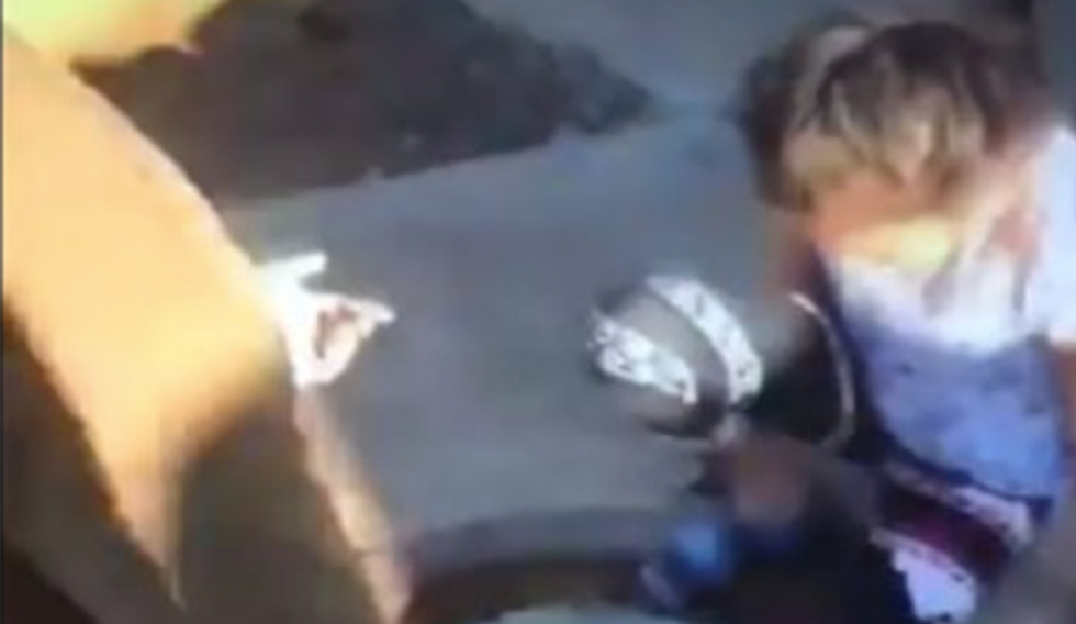 WATCH: Chilling video appears to show terrified Hawaiians hiding their kids in storm drains while Trump golfed