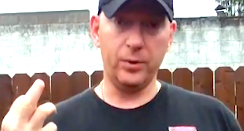 ‘Libtard’-hating ex-police chief accused of pointing gun at woman who passed his Hummer