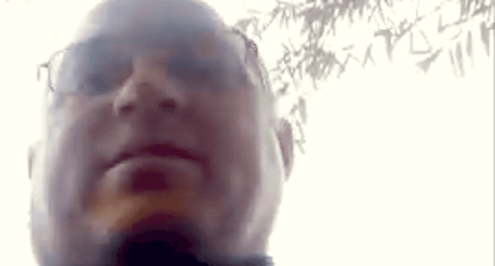 Watch as bullying Houston cop and AR-15 toting gun nut collide over free speech rights