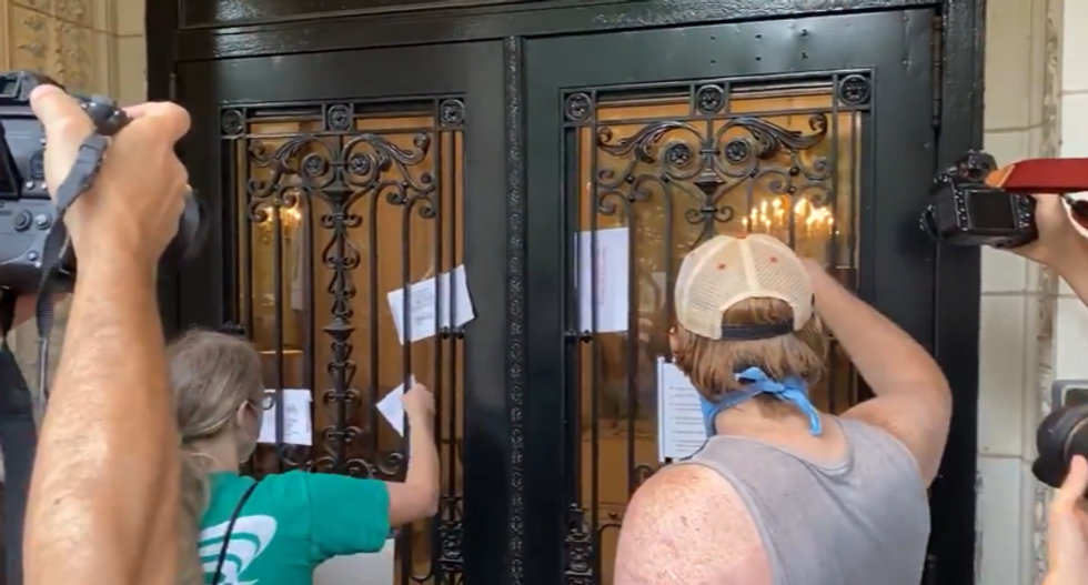 WATCH: Protesters dump ballots outside of USPS head Louis DeJoy's home