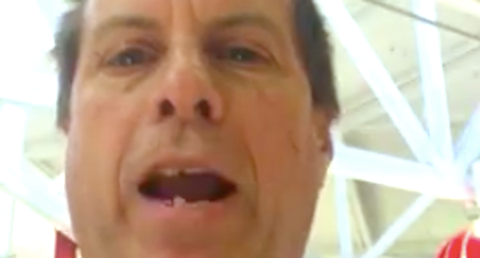 Bellowing Texas pastor tries to spoil Christmas for kids at mall -- and angry fathers shut him down