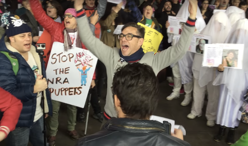 'He's only Putin's b*tch!': 'Gays Against Guns' sing anti-Trump anthem at Women's March