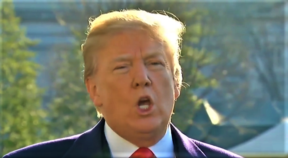 WATCH: Trump pretends not to hear reporters' questions about an apology for John McCain