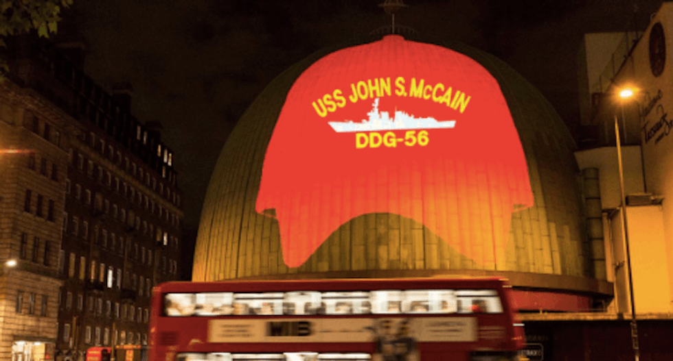 British activists mock Trump with gigantic images celebrating Obama and John McCain