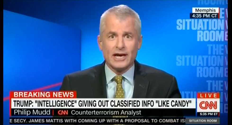 'This guy has to read a book!': CNN panel erupts over Trump's attacks on the media, intel community