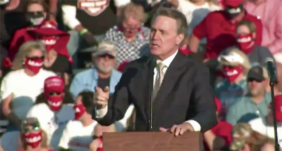 Busted again: Perdue traded hundreds of thousands worth of bank stocks while on Senate Banking Committee