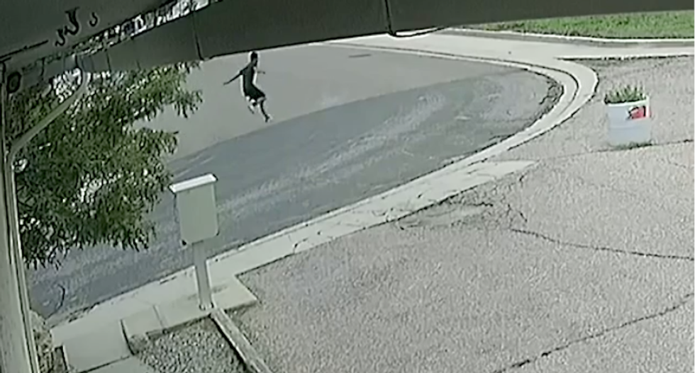 Disturbing video shows cops fatally shooting black teen in his back as he runs away